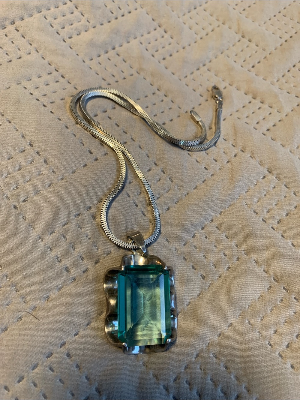 Silver snake necklace with lab aquamarine emerald cut, made in Mexico